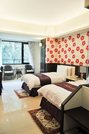 Imagen de la habitación del Hotel Cherry Feast Resort. Foto 25