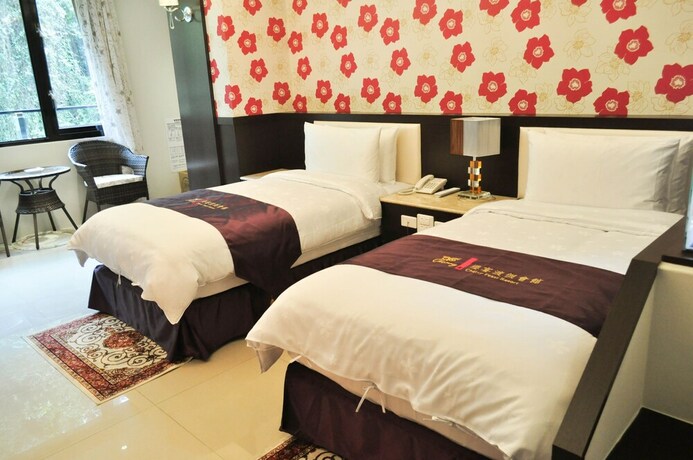 Imagen de la habitación del Hotel Cherry Feast Resort. Foto 31