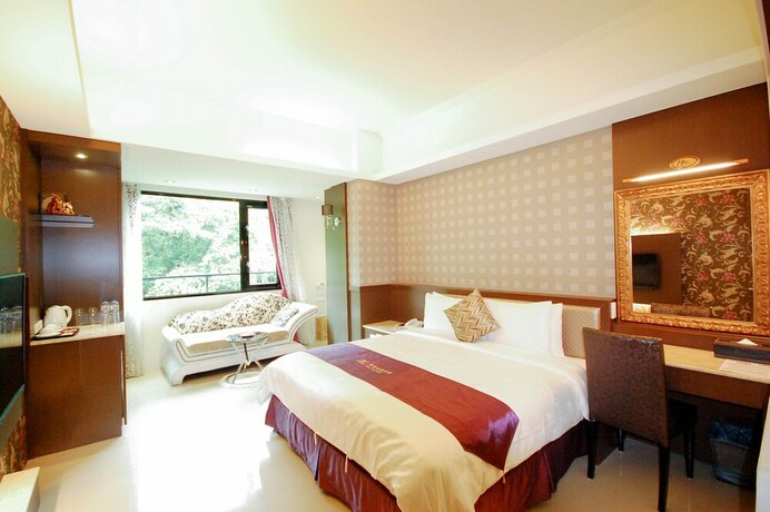 Imagen de la habitación del Hotel Cherry Feast Resort. Foto 34