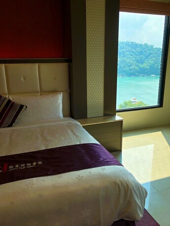 Imagen de la habitación del Hotel Cherry Feast Resort. Foto 36