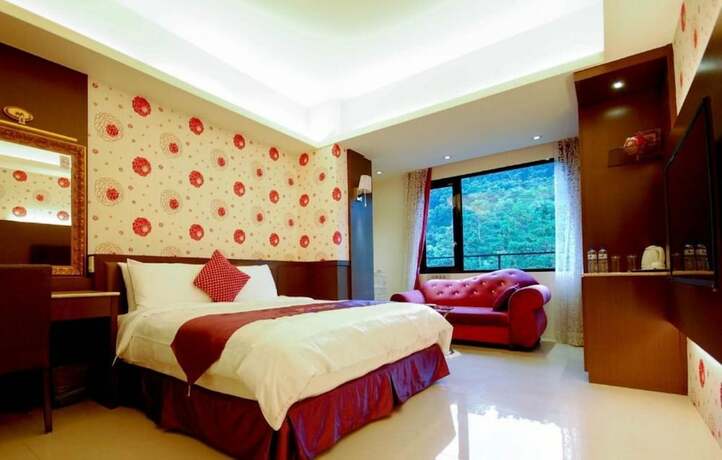 Imagen de la habitación del Hotel Cherry Feast Resort. Foto 39