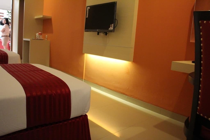 Imagen de la habitación del Hotel Cherry Homes And Residence. Foto 6
