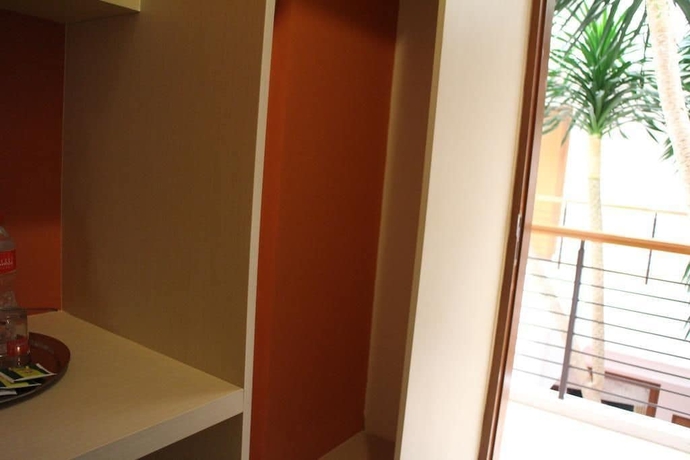 Imagen de la habitación del Hotel Cherry Homes And Residence. Foto 7