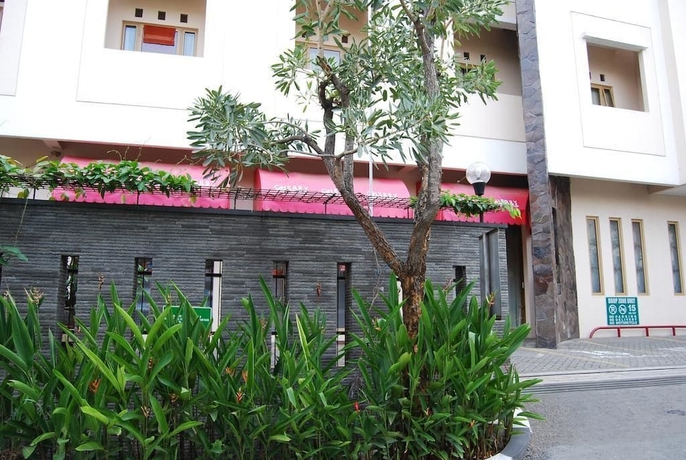 Imagen de los exteriores del Hotel Cherry Homes And Residence. Foto 14