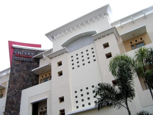 Imagen de los exteriores del Hotel Cherry Homes And Residence. Foto 15