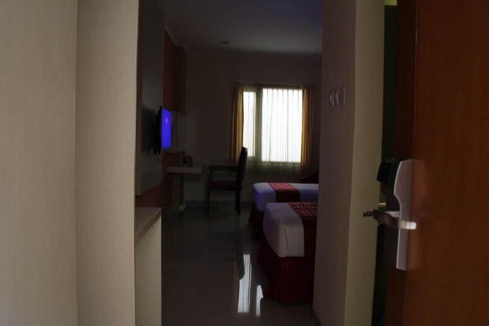 Imagen de la habitación del Hotel Cherry Homes And Residence. Foto 9
