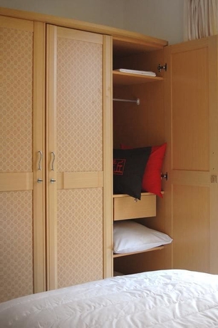 Imagen de la habitación del Hotel Cherry Homes And Residence. Foto 12