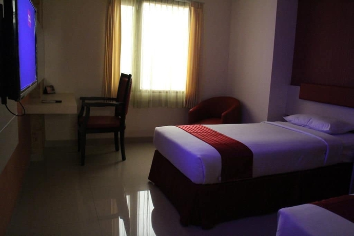 Imagen de la habitación del Hotel Cherry Homes And Residence. Foto 13
