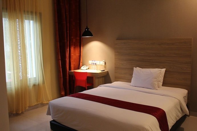 Imagen de la habitación del Hotel Cherry Homes Express. Foto 6