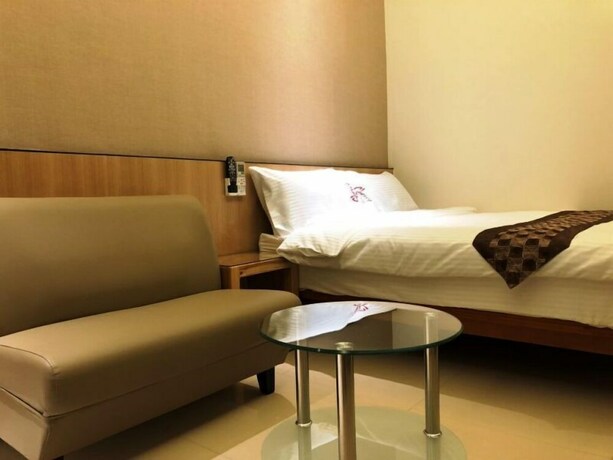 Imagen de la habitación del Hotel Cherry Inn. Foto 12