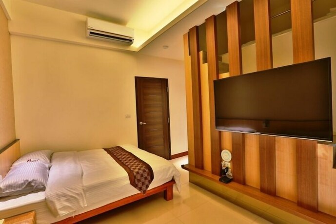 Imagen de la habitación del Hotel Cherry Inn. Foto 13