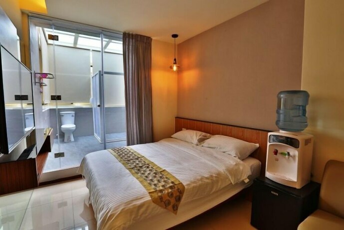 Imagen de la habitación del Hotel Cherry Inn. Foto 32