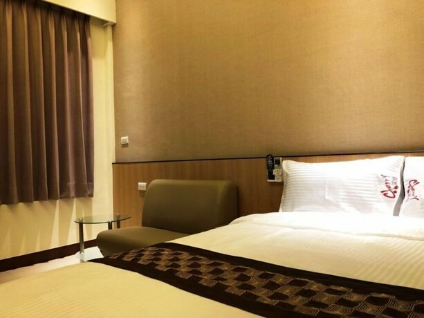 Imagen de la habitación del Hotel Cherry Inn. Foto 37