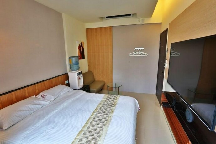 Imagen de la habitación del Hotel Cherry Inn. Foto 38