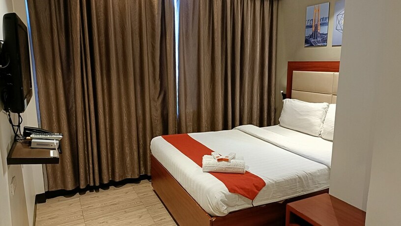 Imagen de la habitación del Hotel Cherry Midtown. Foto 25