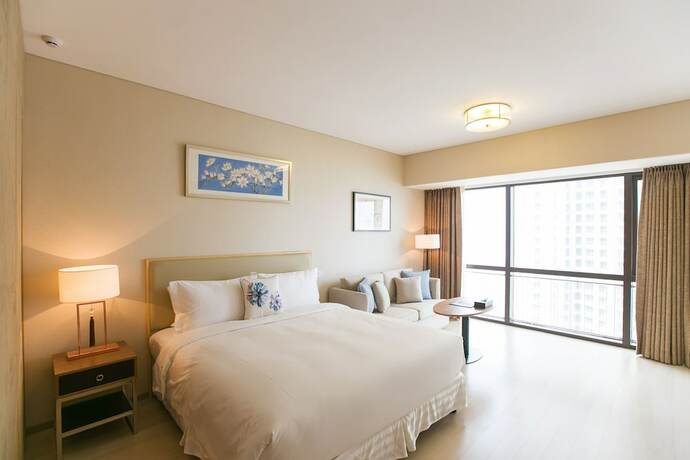Imagen de la habitación del Hotel Cherry Residences May-fourth Square. Foto 12