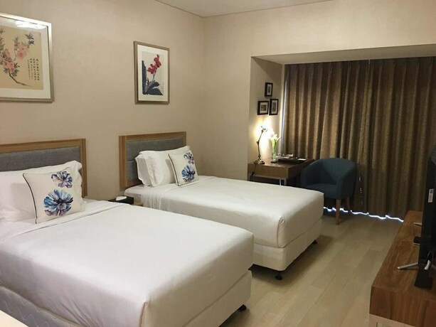 Imagen de la habitación del Hotel Cherry Residences May-fourth Square. Foto 14