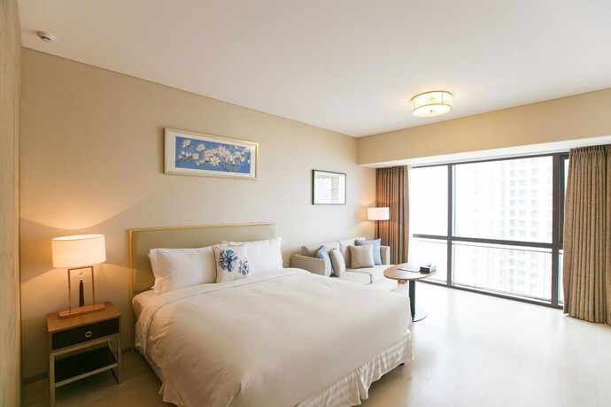 Imagen de la habitación del Hotel Cherry Residences May-fourth Square. Foto 15