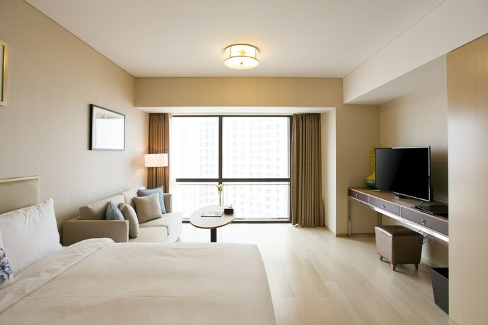 Imagen de la habitación del Hotel Cherry Residences May-fourth Square. Foto 16