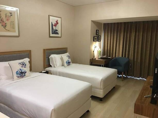 Imagen de la habitación del Hotel Cherry Residences May-fourth Square. Foto 18
