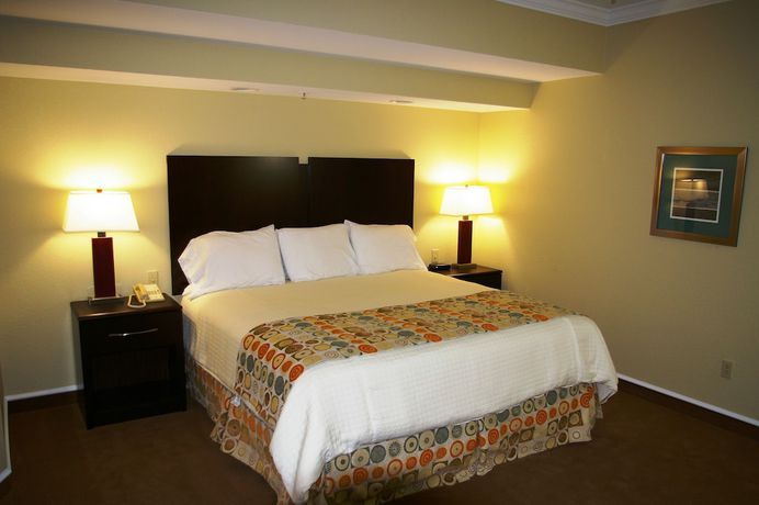Imagen de la habitación del Hotel Cherry Tree Inn And Suites. Foto 8