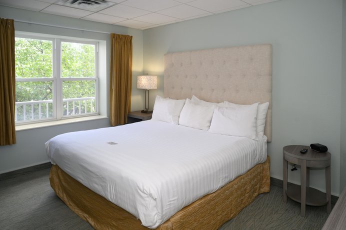 Imagen de la habitación del Hotel Cherry Tree Inn And Suites. Foto 16