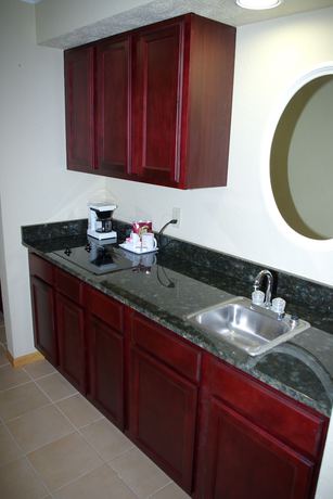 Imagen de la habitación del Hotel Cherry Tree Inn And Suites. Foto 18