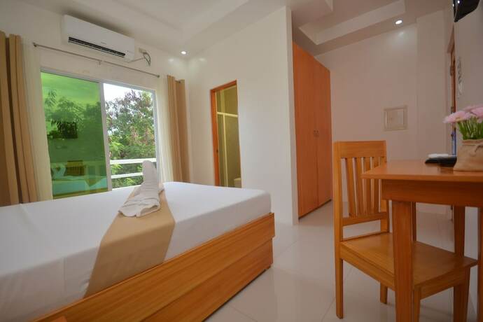 Imagen de la habitación del Hotel Cherry's Court_yard. Foto 26
