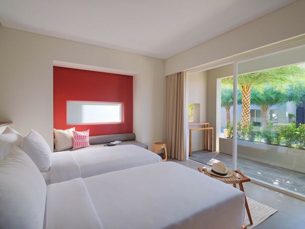 Imagen de la habitación del Hotel Chesa Canggu. Foto 19