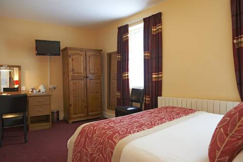 Imagen de la habitación del Hotel Chester House. Foto 6