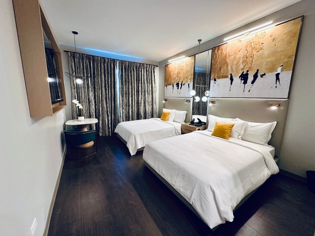 Imagen de la habitación del Hotel Chez Arlington Heights. Foto 14