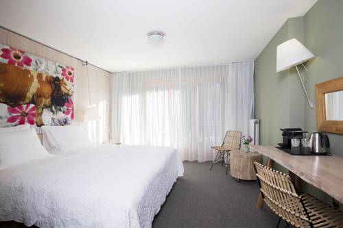 Imagen de la habitación del Hotel Chez Jan. Foto 7