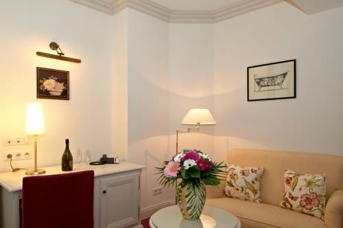 Imagen de la habitación del Hotel Chez Jean. Foto 8