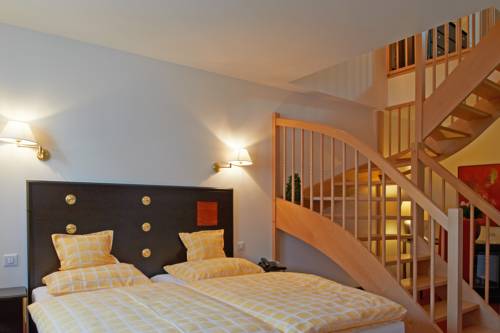 Imagen de la habitación del Hotel Chez Jean. Foto 10