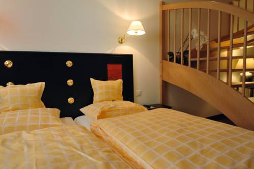 Imagen de la habitación del Hotel Chez Jean. Foto 12