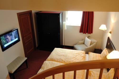 Imagen de la habitación del Hotel Chez Jean. Foto 13