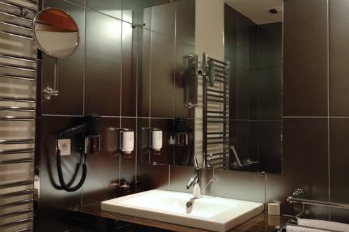 Imagen de la habitación del Hotel Chez Jean. Foto 14