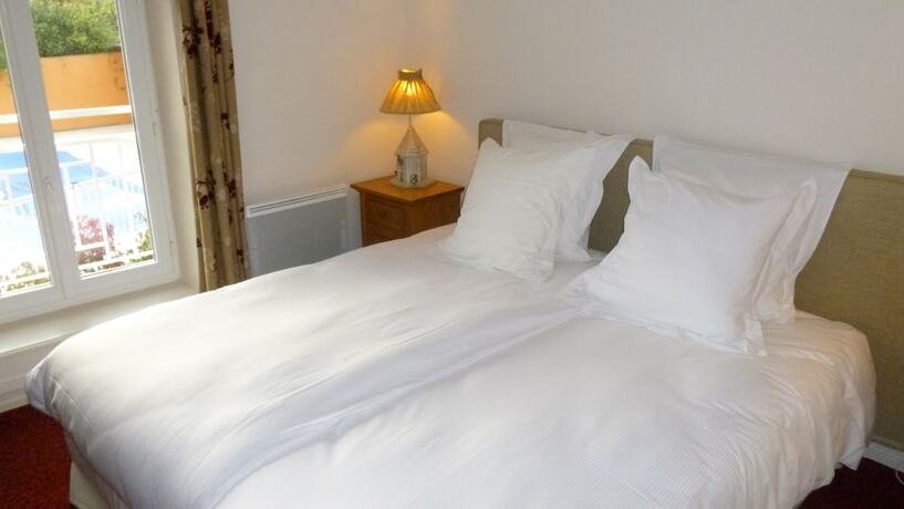 Imagen de la habitación del Hotel Chez La Rose. Foto 13