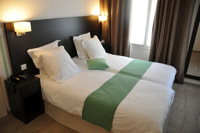 Imagen de la habitación del Hotel Chez La Rose. Foto 19