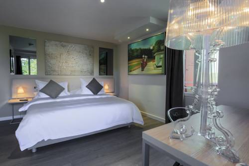 Imagen de la habitación del Hotel Chez Maman & Restaurant. Foto 10