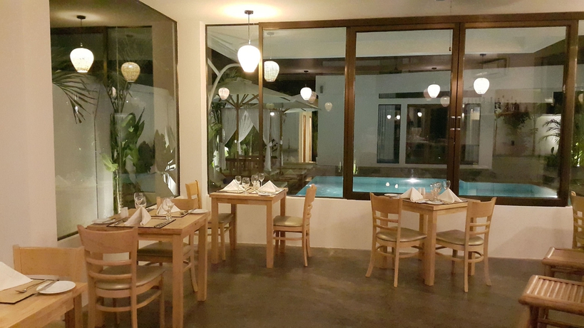 Imagen del bar/restaurante del Hotel Chez Moi Suite and Spa. Foto 5