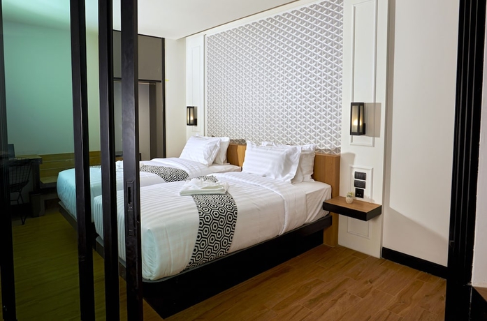 Imagen de la habitación del Hotel Chezzotel Pattaya. Foto 9