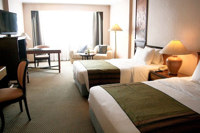 Imagen de la habitación del Hotel Chiang Mai Orchid. Foto 2