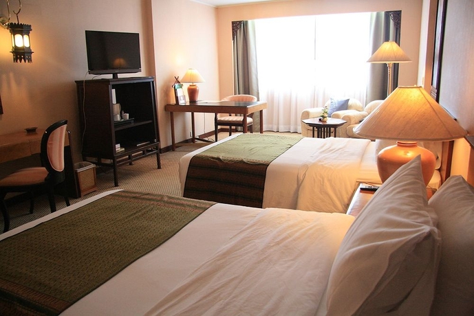 Imagen de la habitación del Hotel Chiang Mai Orchid. Foto 8