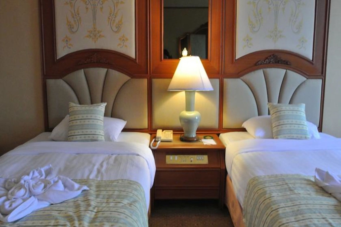 Imagen de la habitación del Hotel Chiang Mai Plaza. Foto 5