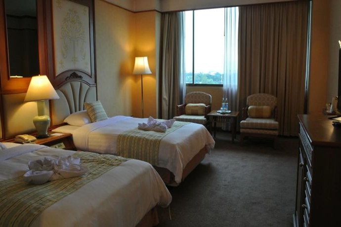 Imagen de la habitación del Hotel Chiang Mai Plaza. Foto 8