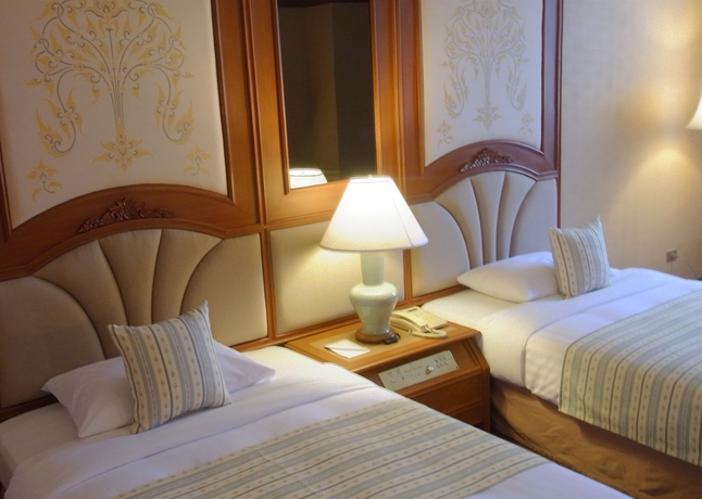 Imagen de la habitación del Hotel Chiang Mai Plaza. Foto 10