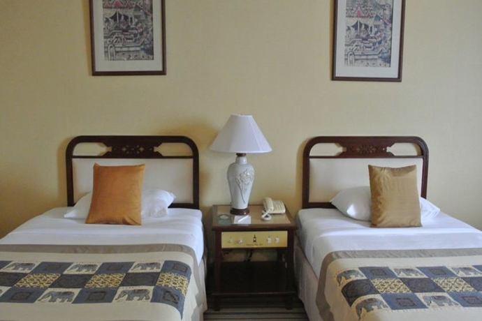 Imagen de la habitación del Hotel Chiang Mai Plaza. Foto 11