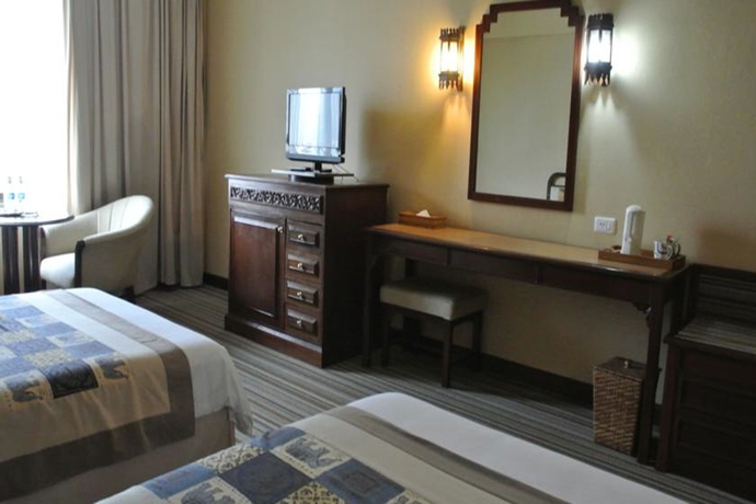 Imagen de la habitación del Hotel Chiang Mai Plaza. Foto 12