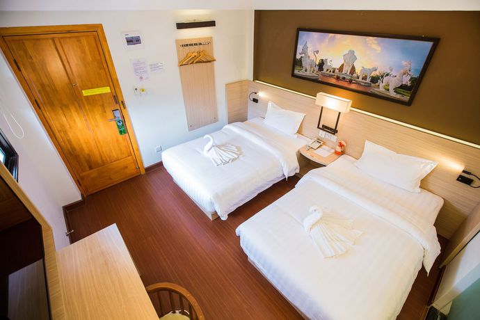 Imagen de la habitación del Hotel Chiang Roi 7 Days Inn. Foto 7